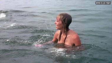 Louise Golding - Losing her top, Topless swimming - Lifeguard (1976)