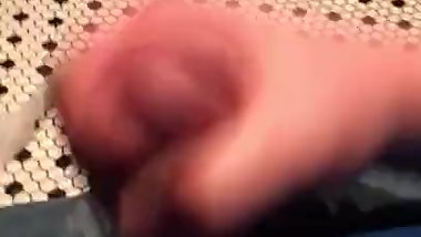 Jacking off in a Chicago bar bathroom to old fashion pornography photos