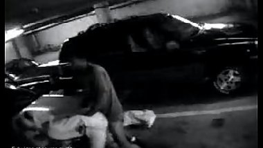 Security camera in parking lot catches couple having sex