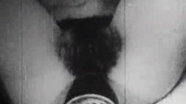 Vintage Hairy Lady masturbates with bottle