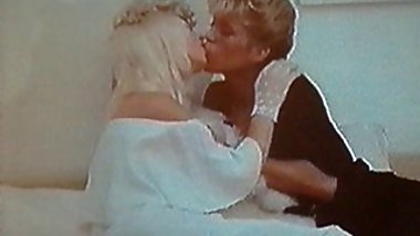 Ilona Staller and John Holmes in a Threesome