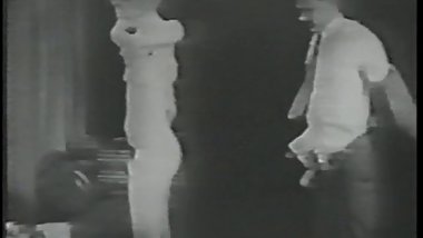 Horny chick fingers her pussy in a black and white porn