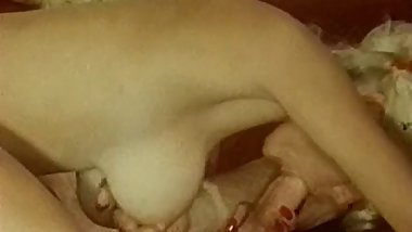 Busty blonde takes double penetration on couch