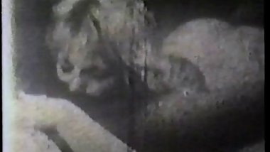 A sexy black chick and a white slut fuck each other and share a wite cock