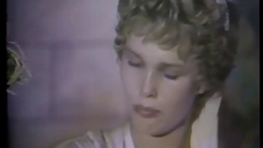 Dark haired slut sucks a blonde guy's dick in period costumes