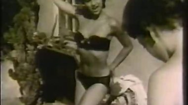 Vintage women playing  around outdoors