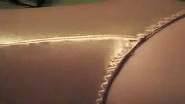 Gold satin panties close-up
