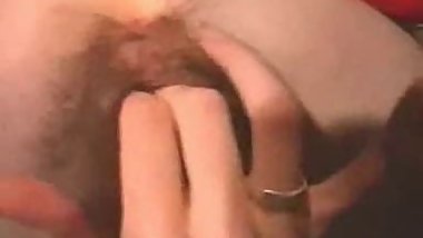 dildoing and fingering a very hairy french pussy