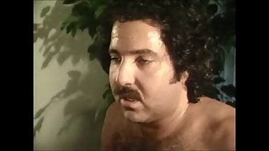 Raven Richards gives Ron Jeremy a blowjob
