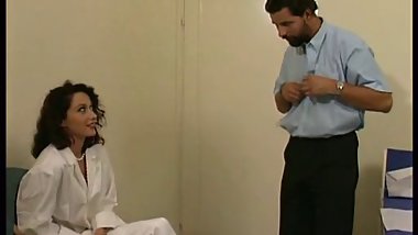 Lovely brunette doctor in sexy white lingerie and stockings