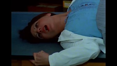 Teacher in a beautiful pleated skirt is fucked on a table