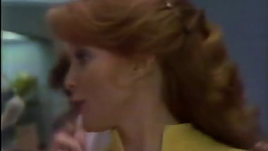 Two broads try on Playtex bras.