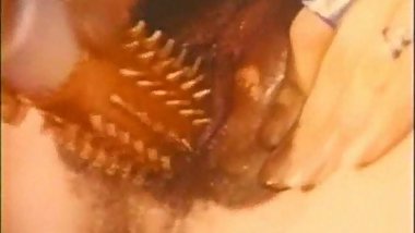 Tina Russell having a great time using a spiky toy