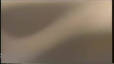 a woman naked and in the dark